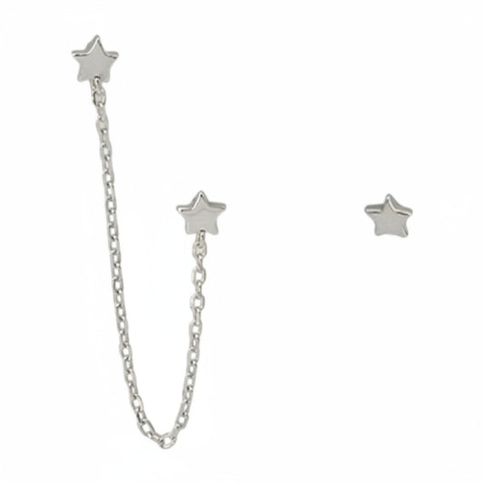 Yamor Jewelry gold star double chain earrings. One earring features a star stud connected by a chain to a second star.